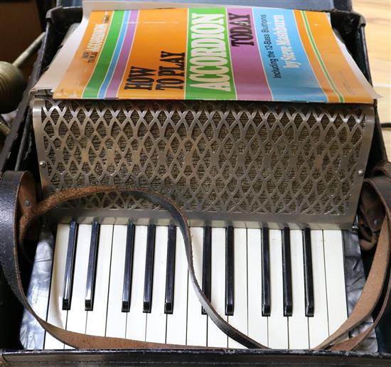 A Hohner accordian, cased